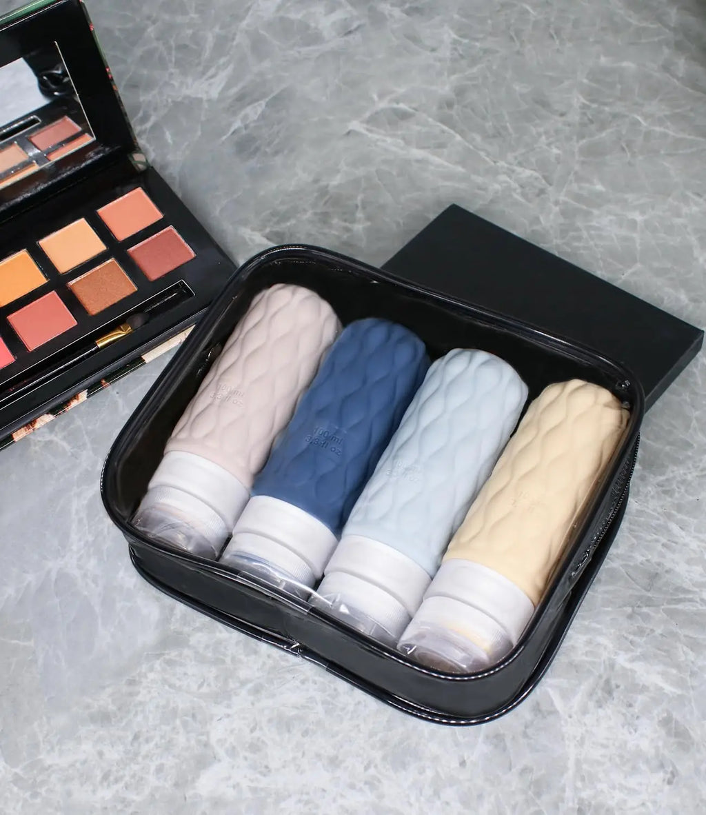 4-Pack 100ml Leak-Proof Silicone Travel Bottles + Toiletry Bag Travel Bottle Set QXL