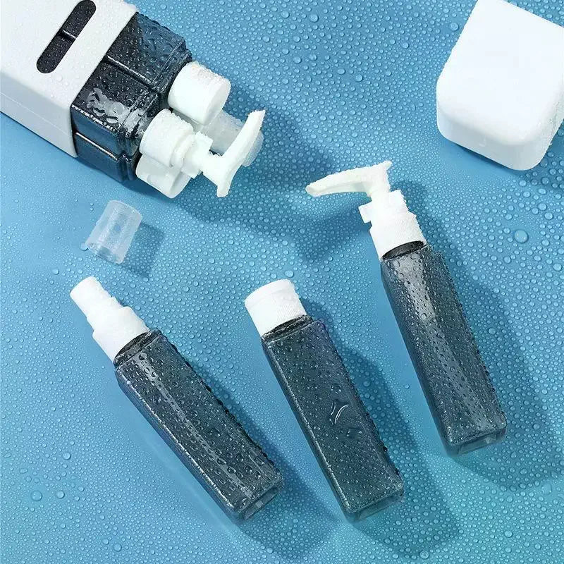 4-in-1 Refillable 60ml Travel Bottle Set with Pump Dispensers Travel Bottle Set QXL