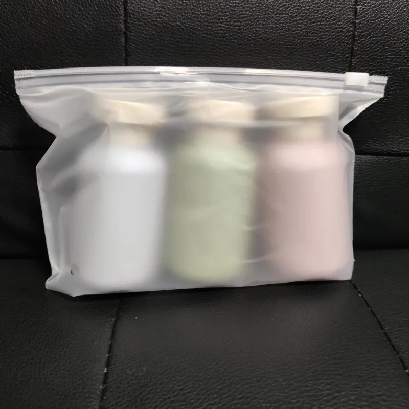100ml Refillable Travel Bottles with Zipper Pouch & Labels Travel Bottle Set QXL Plastic Set-a