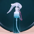 60ml Refillable Travel Spray Bottle with Carabiner Hook Travel Spray Bottle QXL Light blue