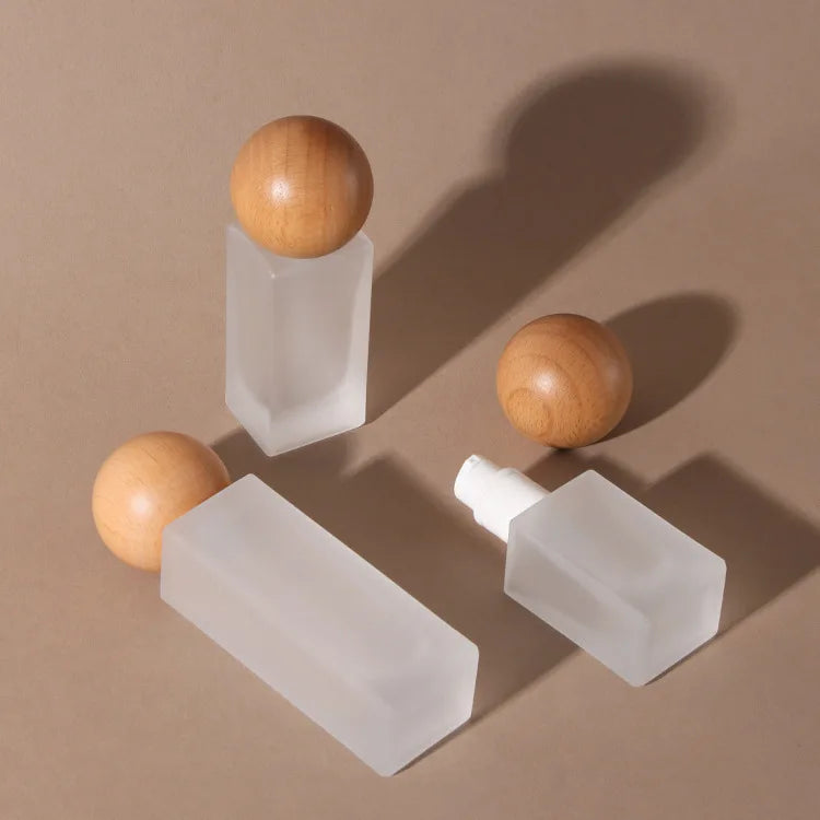 Frosted Glass Lotion Pump Bottle with Wood Cap | 20–120ml Glass Pump Bottle QXL