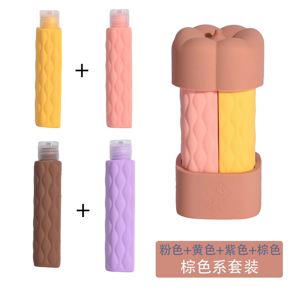 4-in-1 TSA Approved Silicone Travel Bottles for Toiletries Travel Bottle Set QXL brown