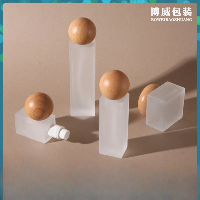 Frosted Glass Lotion Pump Bottle with Wood Cap | 20–120ml Glass Pump Bottle QXL 120ml-lotion Glass