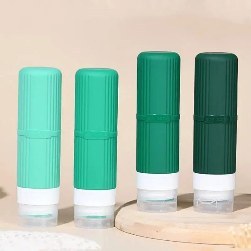4-Pack Refillable Travel Bottles – Leak-Proof Squeeze Set Travel Bottle Set QXL